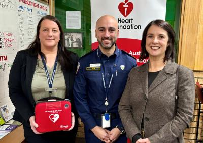 Ambulance Tasmania's Kylie Kapeller (Manager, Community First Responders and Volunteers), Tim Makrides (Executive Director, Clinical Services) and Joce Nettlefold (General Manager Tasmania, The Heart Foundation).