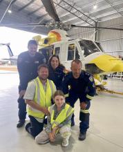 Back row: Rotorlift Pilot Thomas, Dr Anke and Andy from Ambulance Tasmania. Front row: Kieran and Maisie.