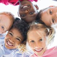 Group of young children smiling